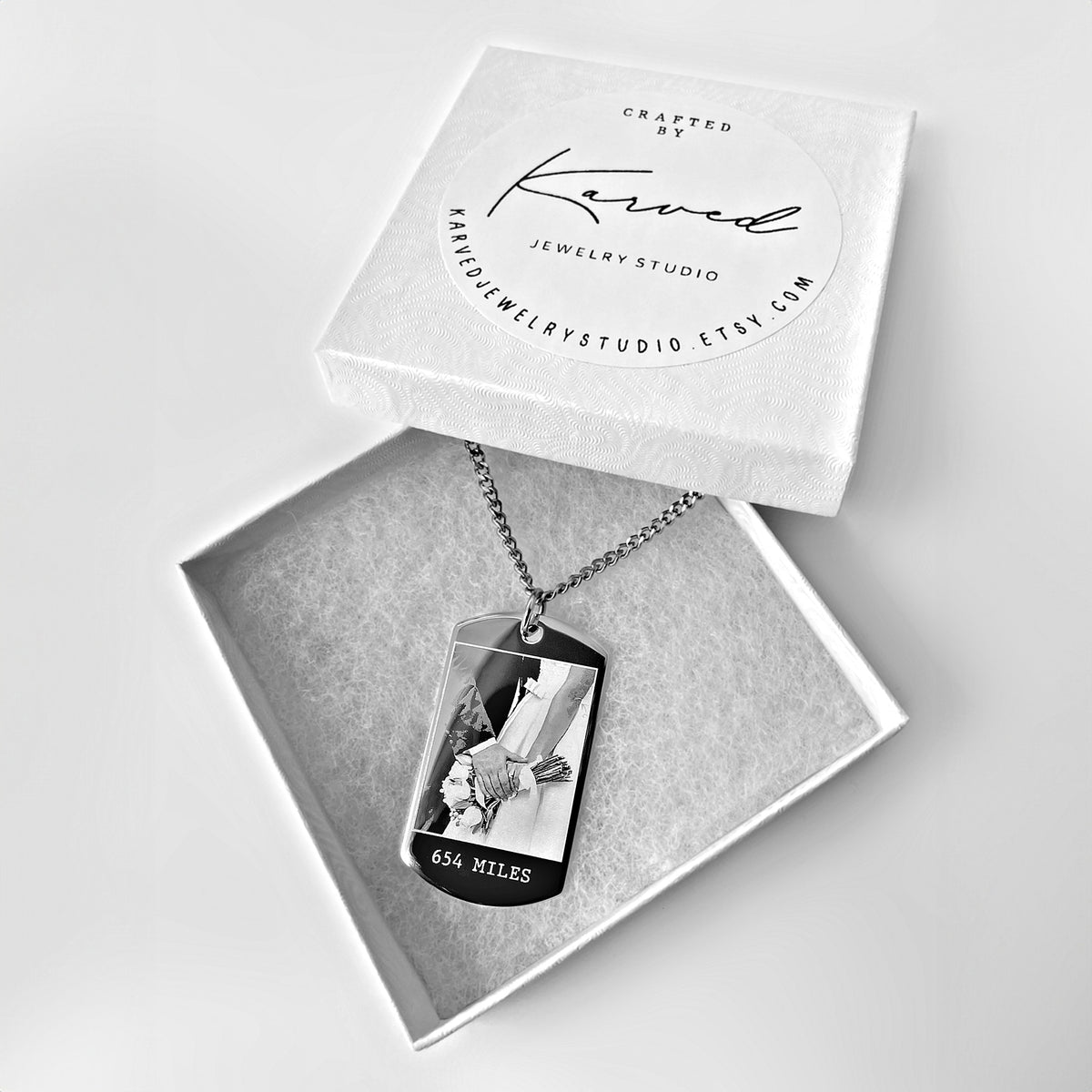 Custom long-distance relationship dog tag necklace displayed in a gift-ready jewelry box