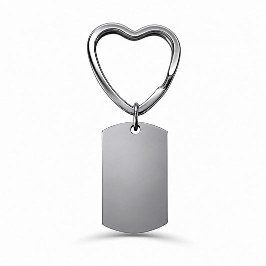 Blank dog tag urn keychain with heart-shaped keyring on white background