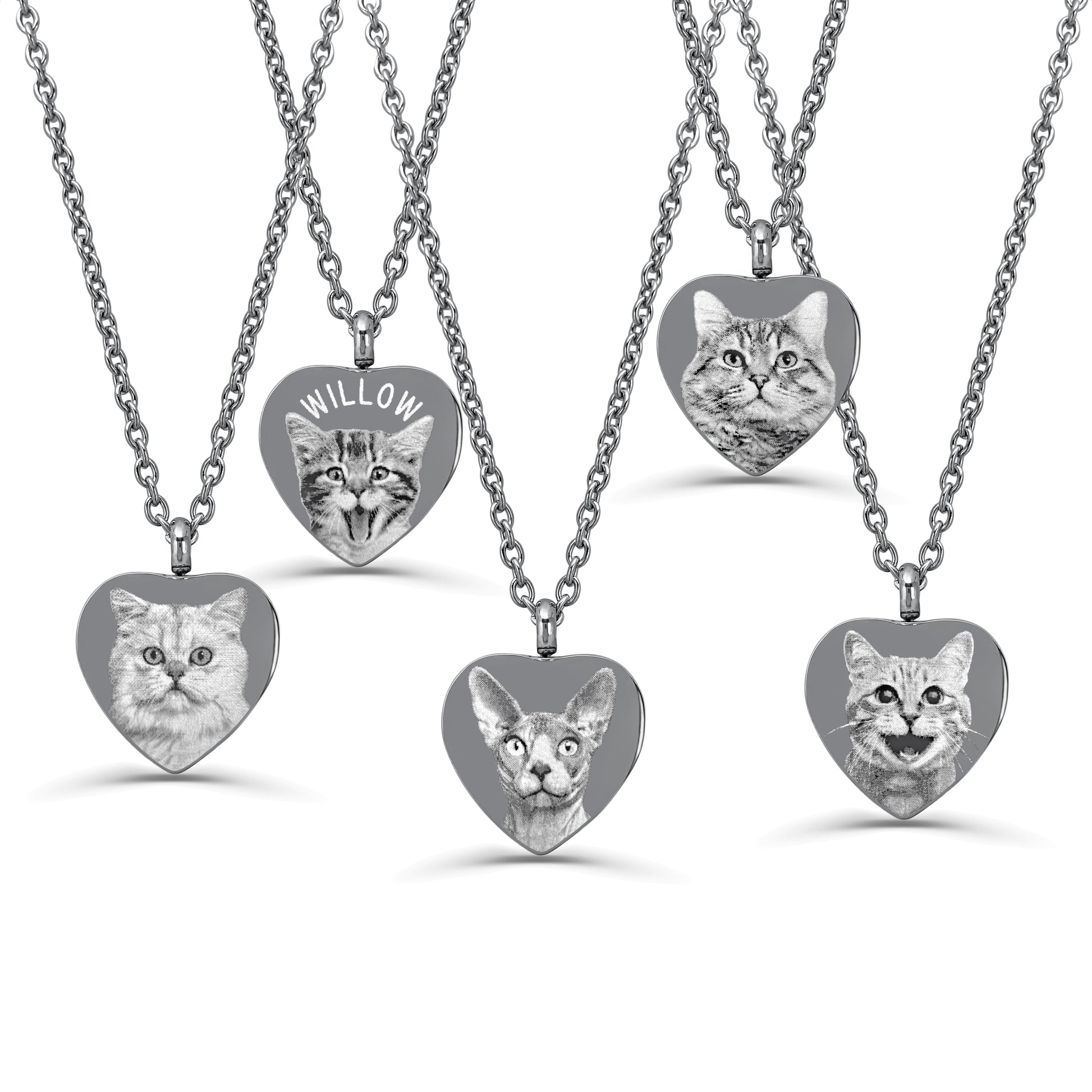 A stainless-steel cremation urn necklace with heart-shaped pendants featuring engraved images of cats.