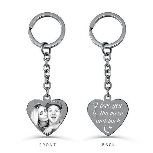 Custom couple photo heart keychain showing portrait engraving on the front and personalized message " I love you to the moon and back" on the back