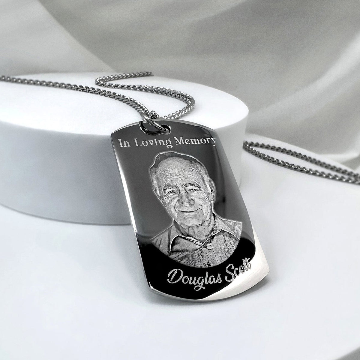 Personalized Dad memorial dog tag necklace with custom portrait engraving displayed on a soft neutral background