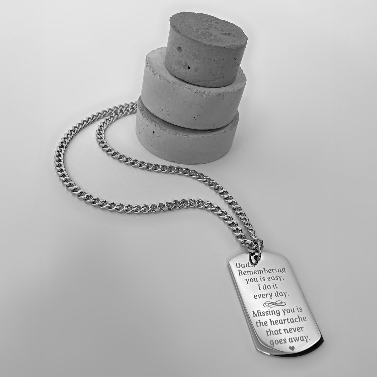 Dad memorial dog tag necklace engraved with “Remembering you is easy, missing you is the heartache that never goes away”