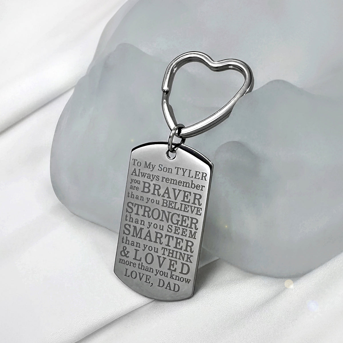 Personalized son dog tag keychain with heart-shaped keyring and encouraging message from Dad about being braver, stronger, smarter, and loved