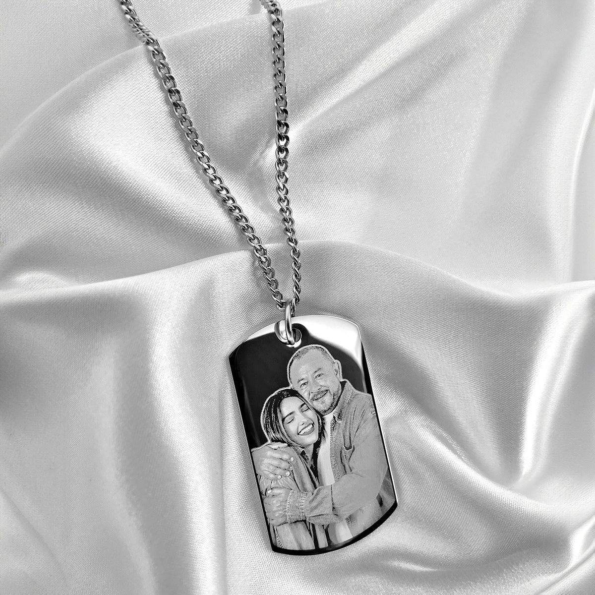 Custom father daughter memorial photo dog tag necklace displayed on satin