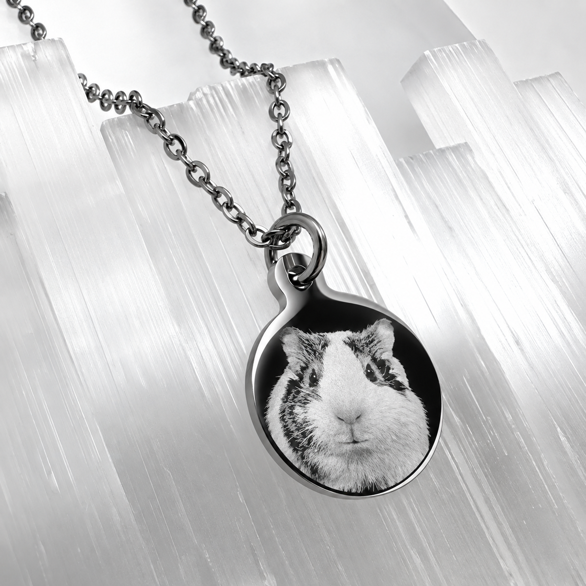 Personalized silver round pet portrait necklace featuring a guinea pig photo engraved on a polished stainless-steel pendant.