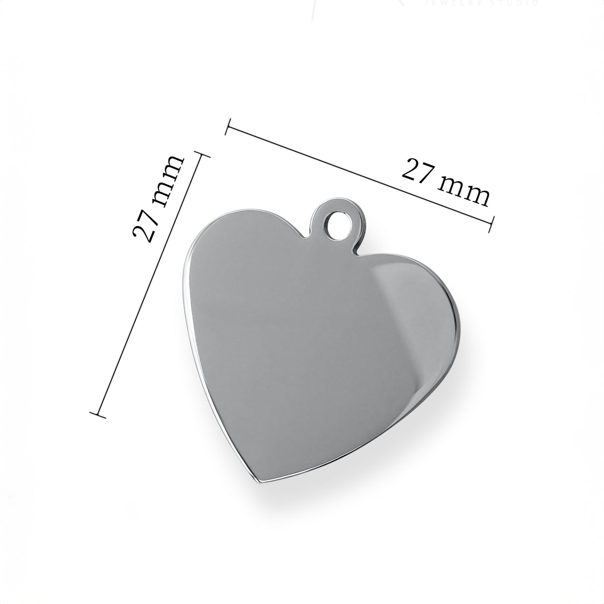 Silver heart blank showing the dimensions, ready for engraving