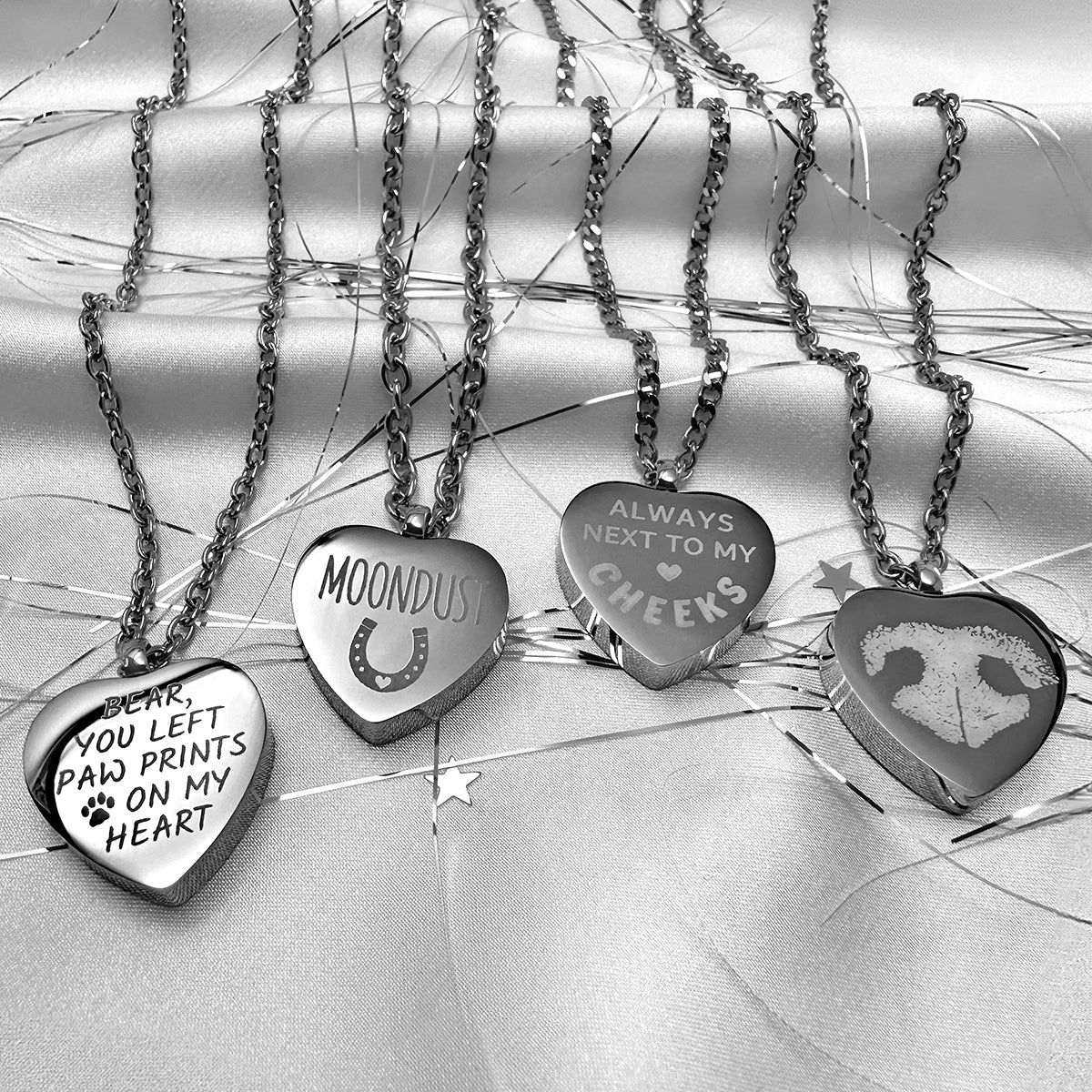 Personalized heart memorial urn necklaces with pet names, dates, paw prints, nose prints, memorial poems and engraved messages