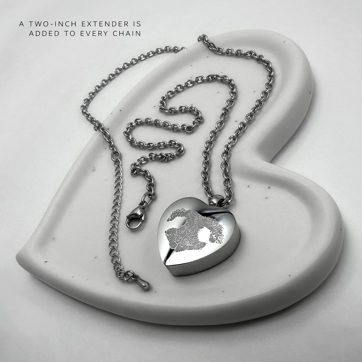 Custom pet nose print engraved on a heart-shaped stainless steel memorial heart urn necklace