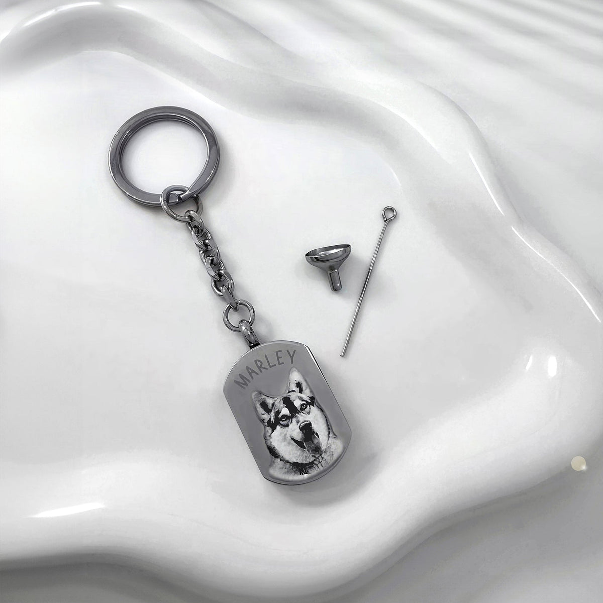 Custom dog tag urn keychain personalized with a pet photo portrait shown with fill kit for ashes, fur, hair, or dried flowers