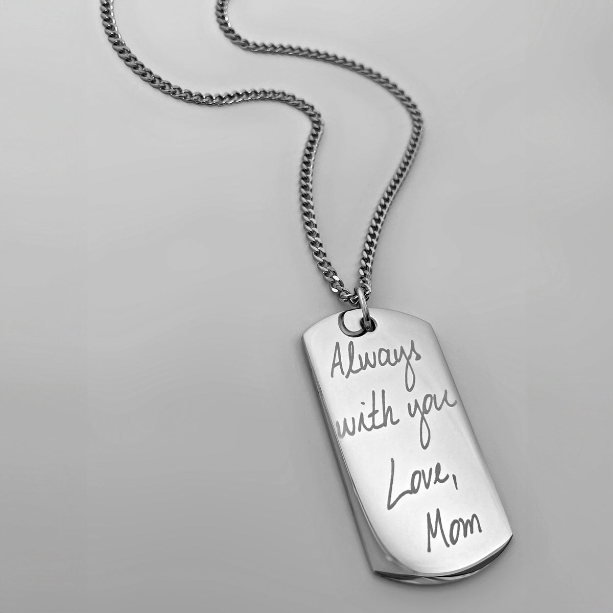 Custom dog tag necklace engraved with handwritten “Always with you, Love Mom” message