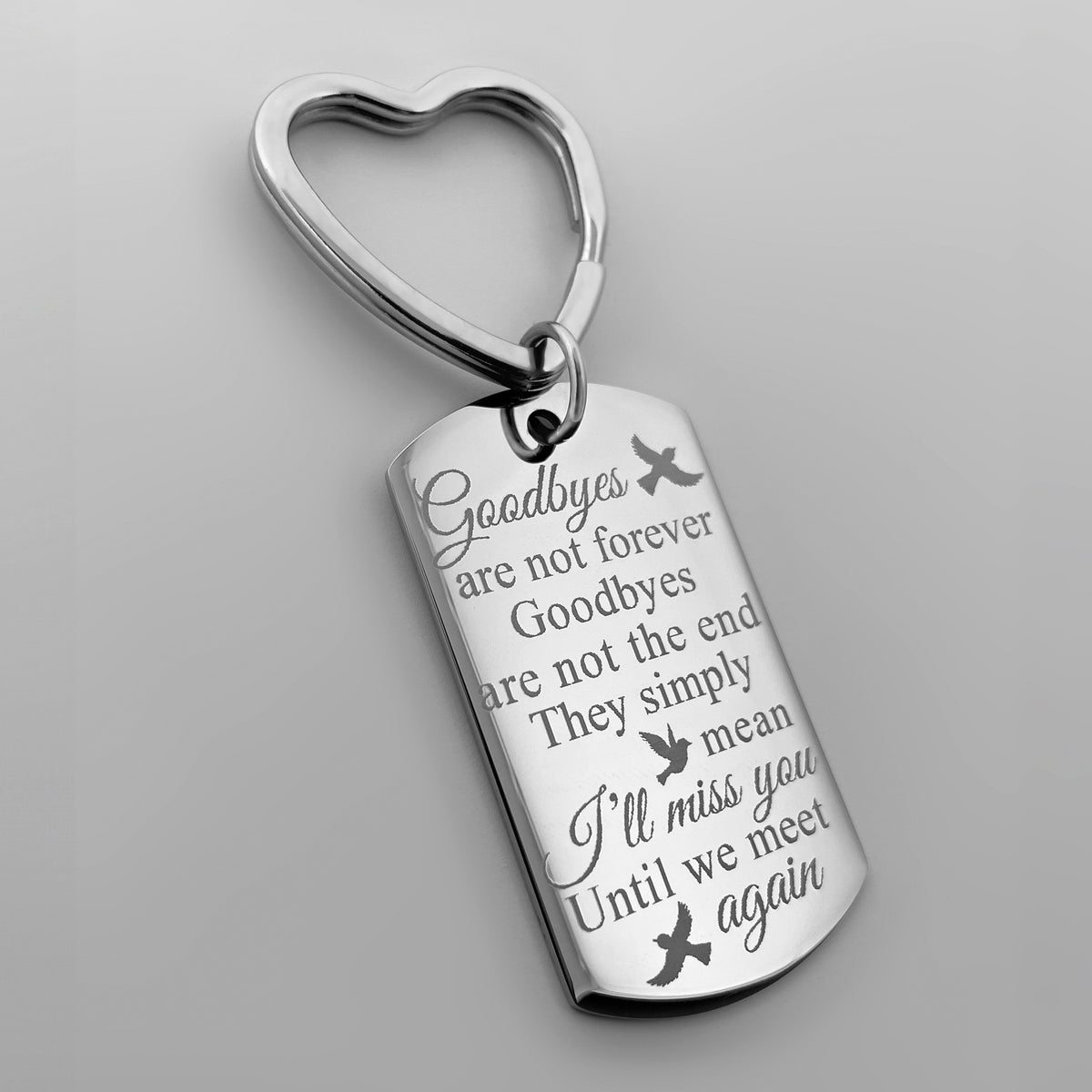 Sister memorial dog tag keychain with heart-shaped keyring engraved “Goodbyes are not forever, goodbyes are not the end”