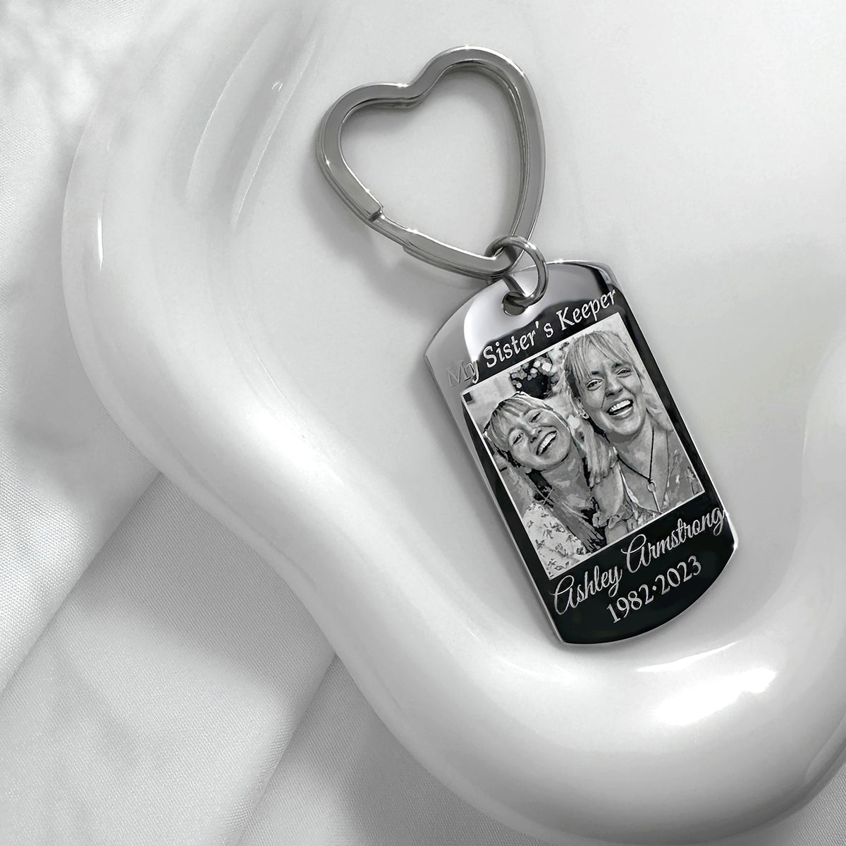Personalized sister photo memorial dog tag keychain with heart-shaped keyring and custom portrait engraving