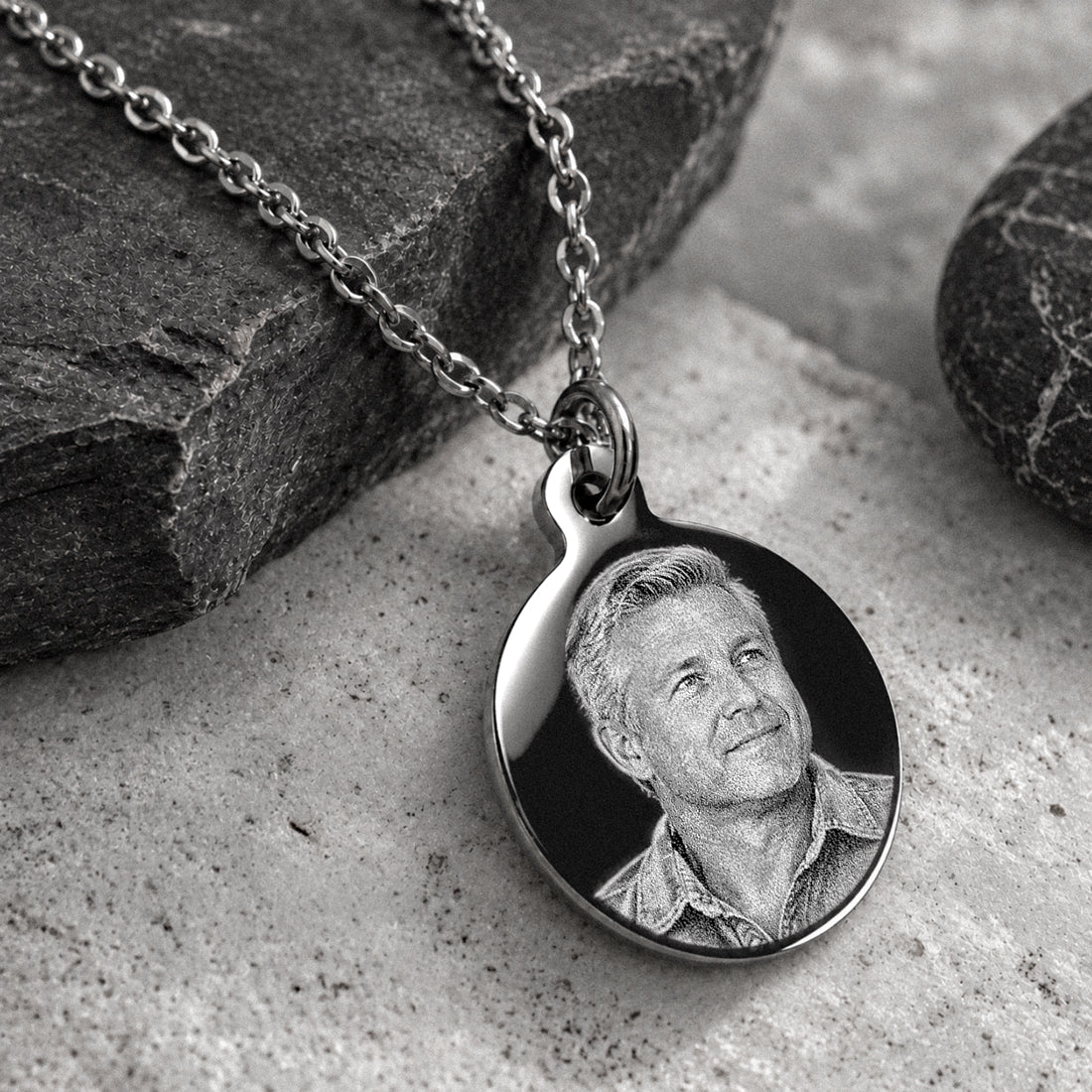 Custom engraved photo pendant necklace featuring a man's portrait on a round stainless steel charm