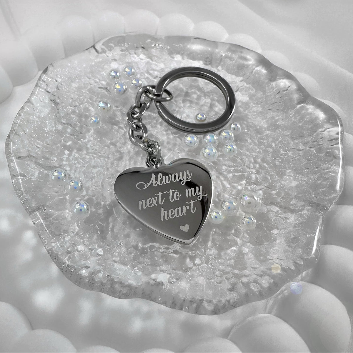 Memorial silver heart keychain engraved with custom “Always next to my heart” remembrance message