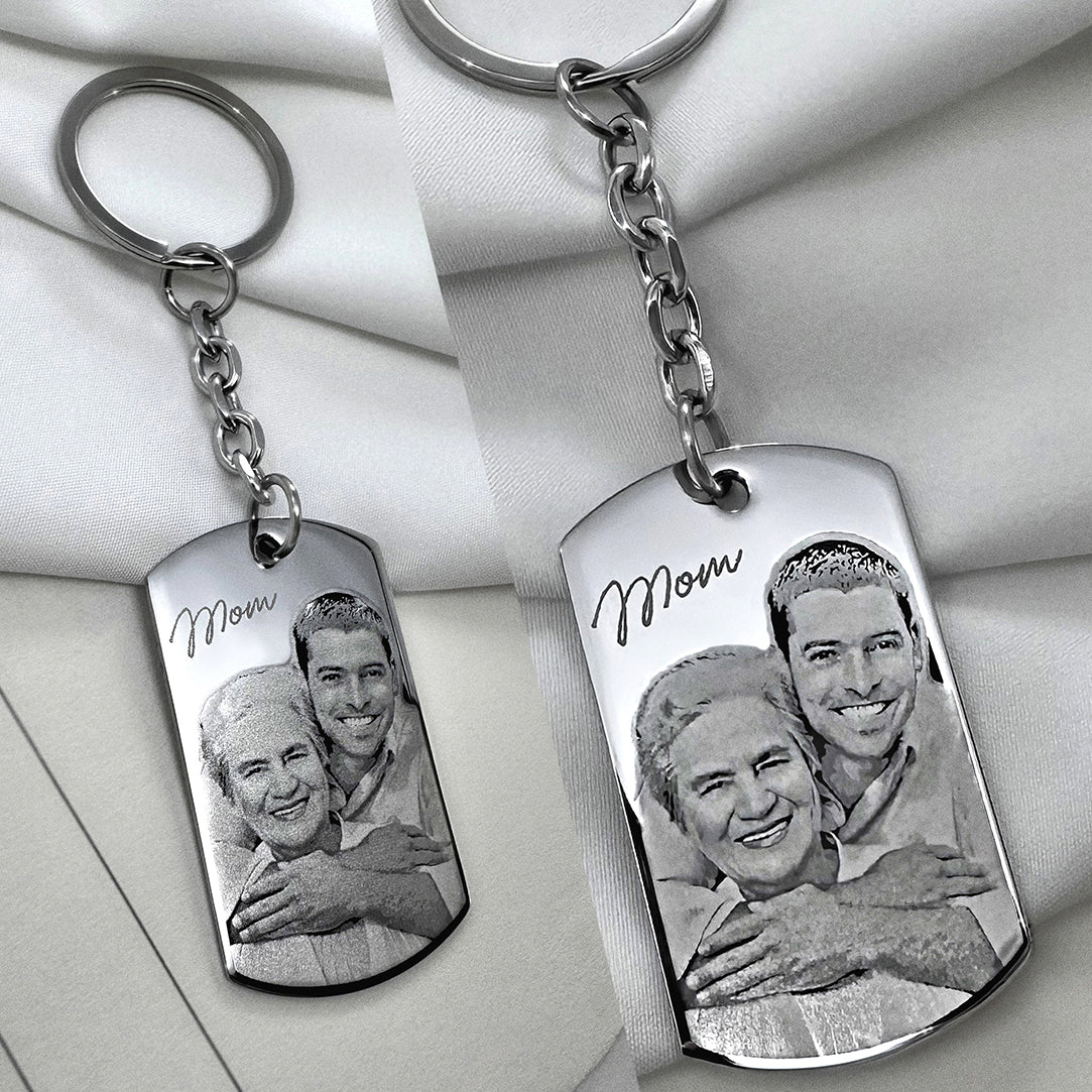 Personalized Mom memorial dog tag keychain with custom mother and son portrait engraving displayed in a lifestyle setting