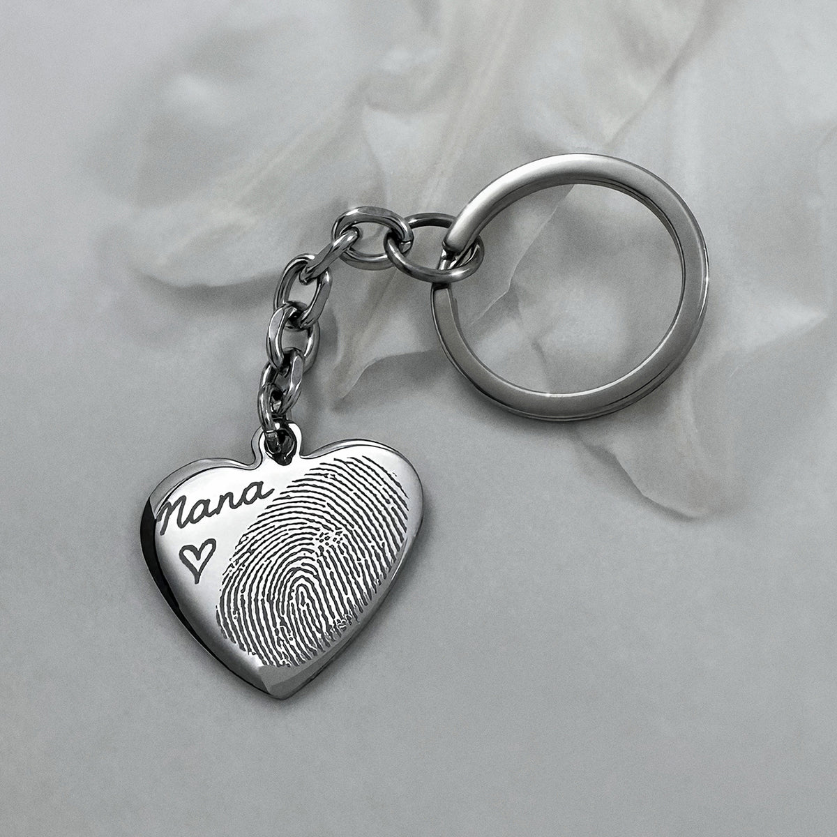 Personalized Grandma memorial heart keychain with an actual fingerprint engraving and custom handwriting saying "Nana"