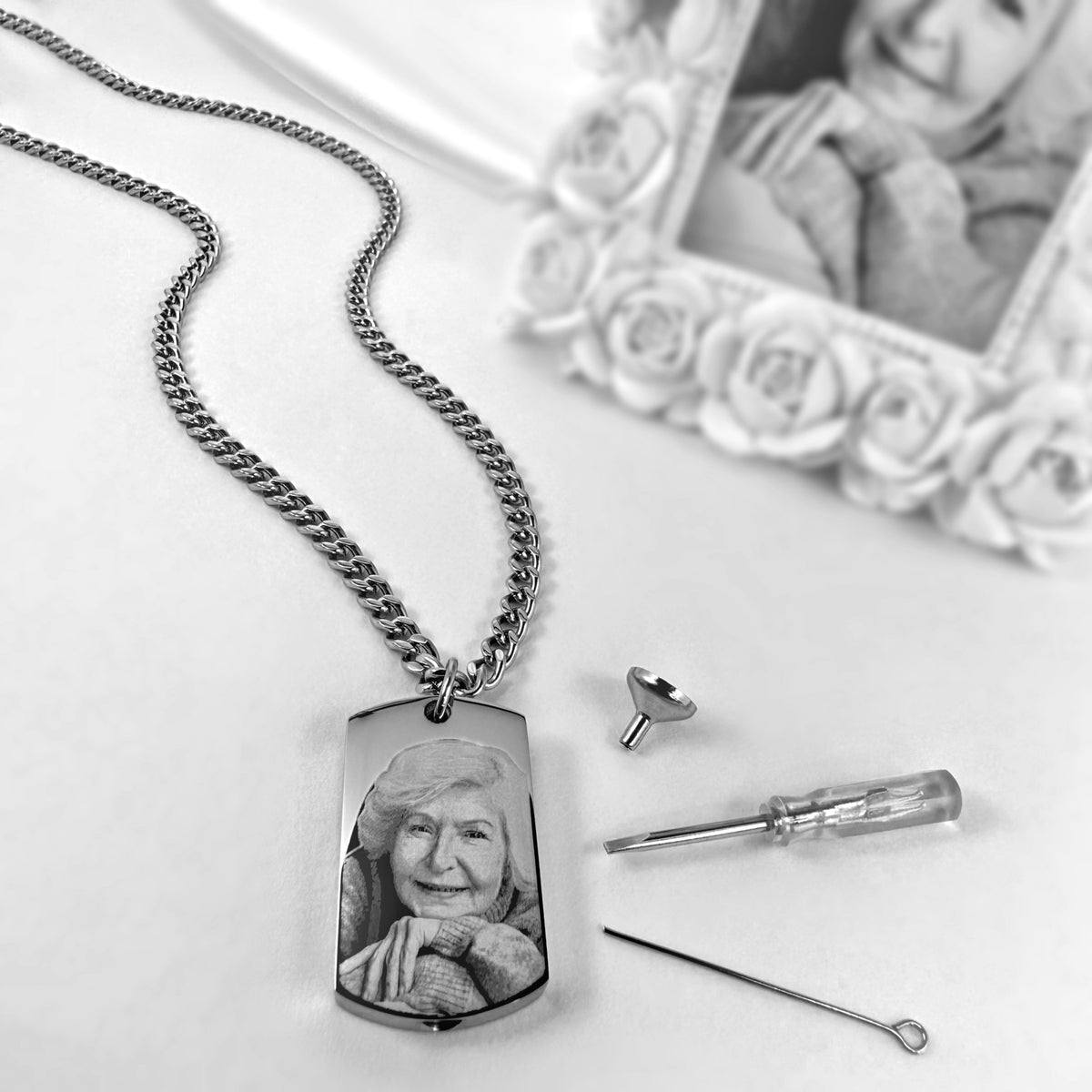Custom photo dog tag urn necklace shown with fill kit for ashes, fur, hair, or dried flowers