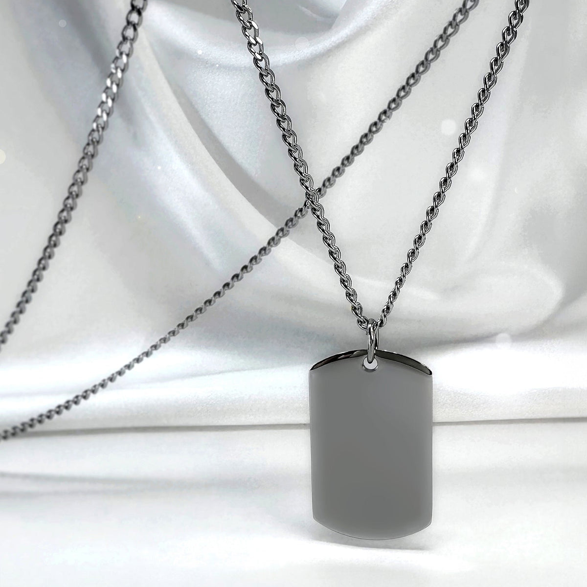 Blank polished small dog tag necklace displayed on soft satin, ready for custom photo, fingerprint, handwriting, or message engraving