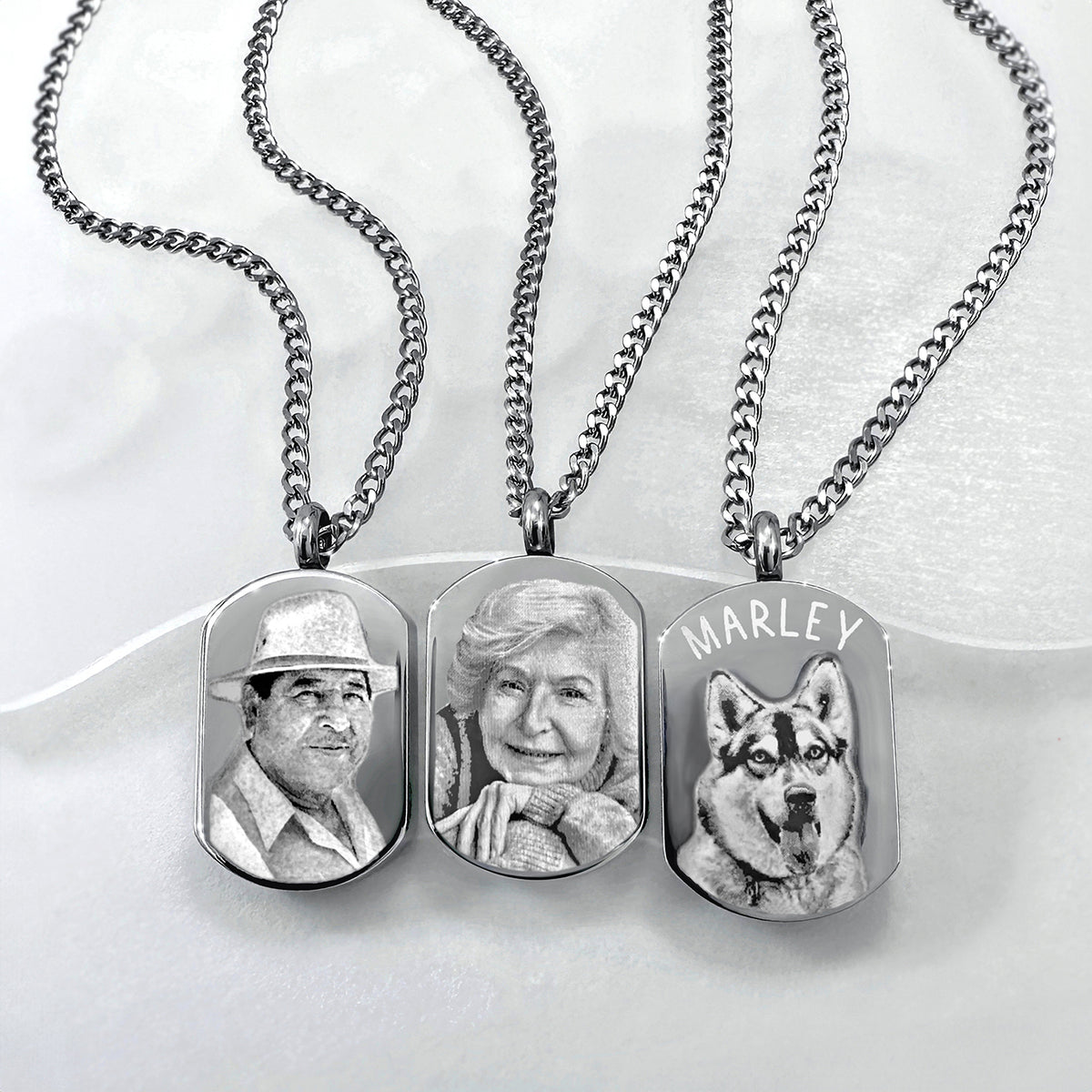 Small dog tag urn necklace examples with personalized portraits and pet photo engravings